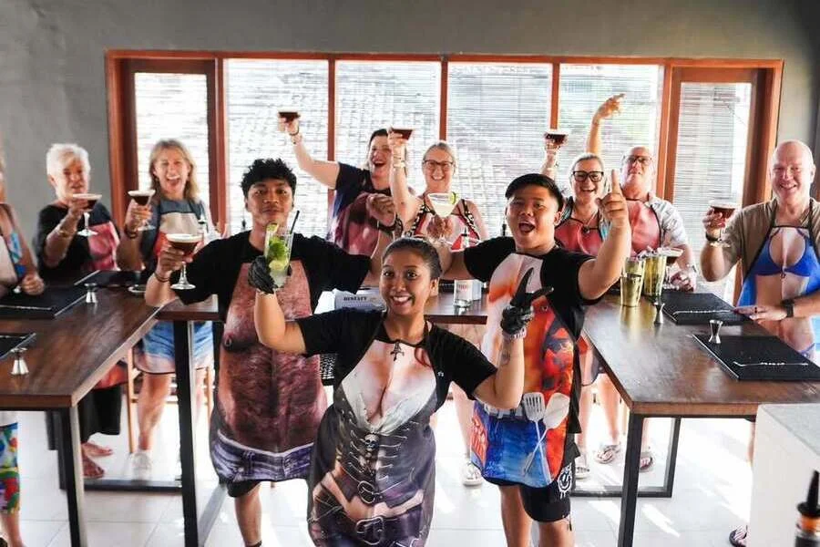 People holding drinks at Frankies Bar cocktail class